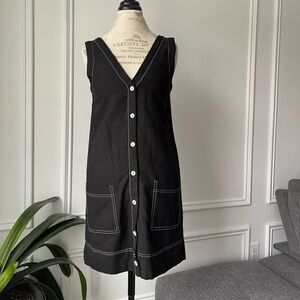 Elegant black shift dress with white contrast topstitching